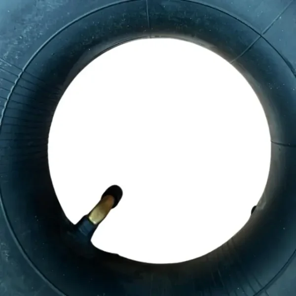 Close up of straight Schrader valve on inner tube